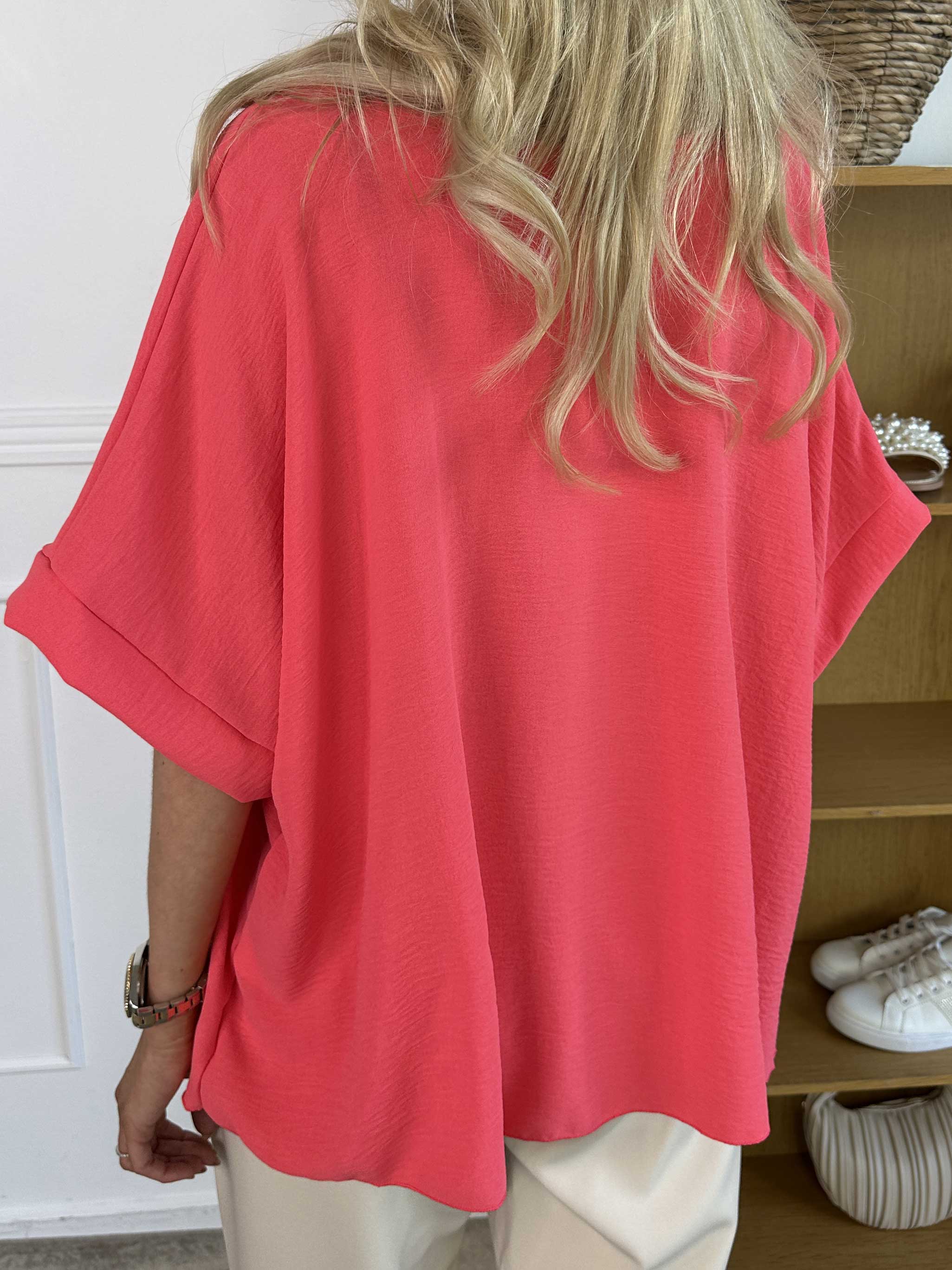 Tabisha - Söt lättviktstunika med blomma och fuskpäls på bröstet